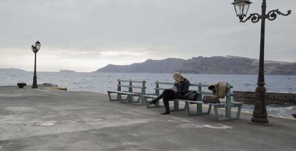 A woman sitting on a bench