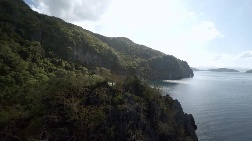 View of a cliff and mountainous island,