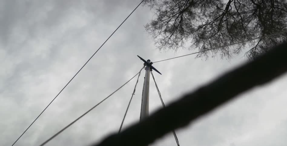 Electric pole and wires on a stormy day