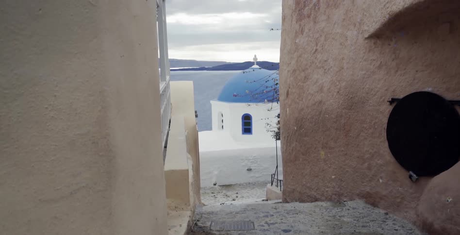 A church dome at the end of an alley