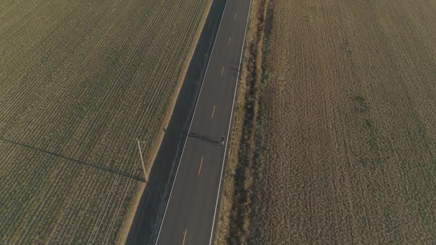 A person riding a bike on the road