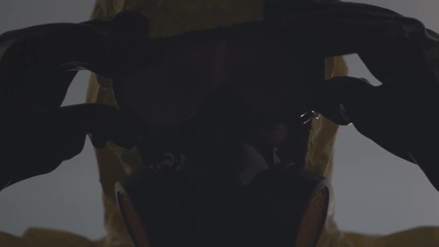 Person in a hazmat suit