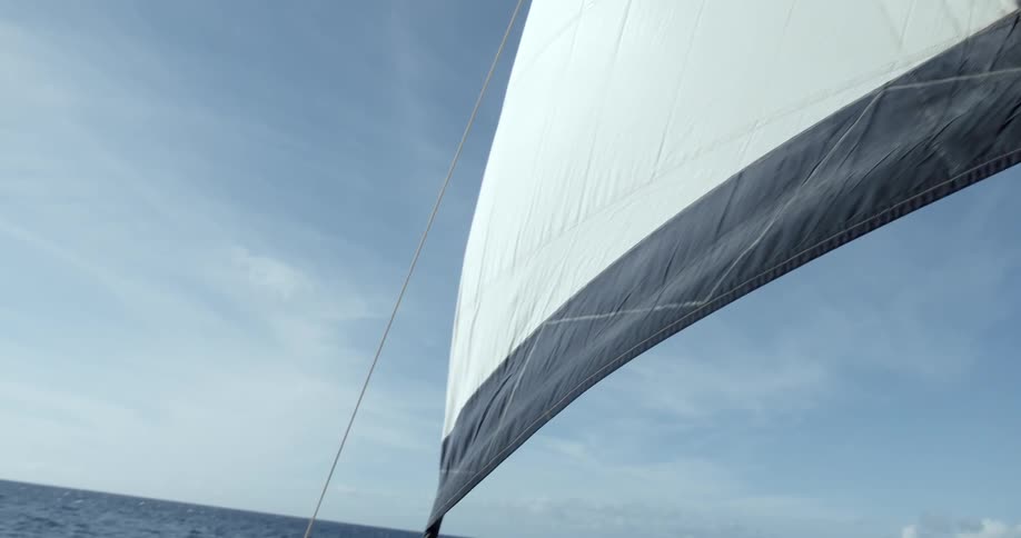 Looking up at the sail of a ship