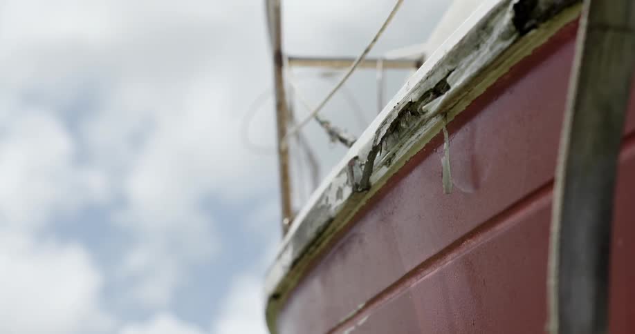 A breeze blows against the side of a boat