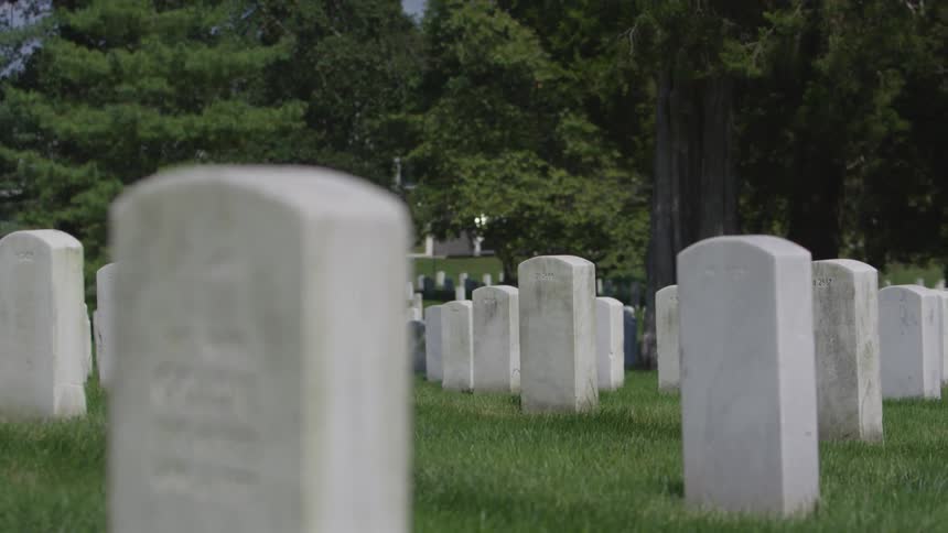 A view of a headstones in a cemetery