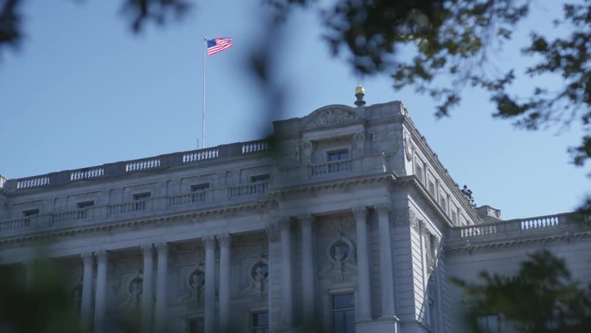 An american flag on top of a building