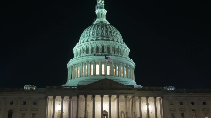 The united states capitol building at night