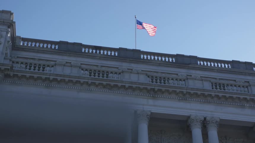 A flag on top of a building
