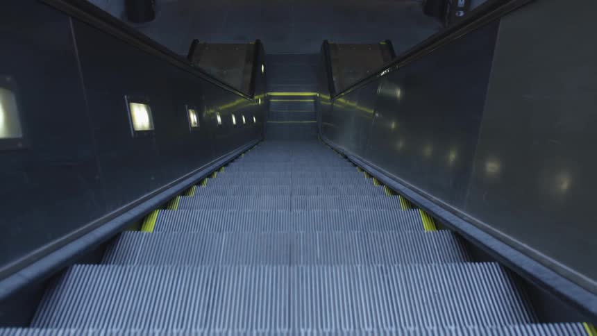 An escalator moving up