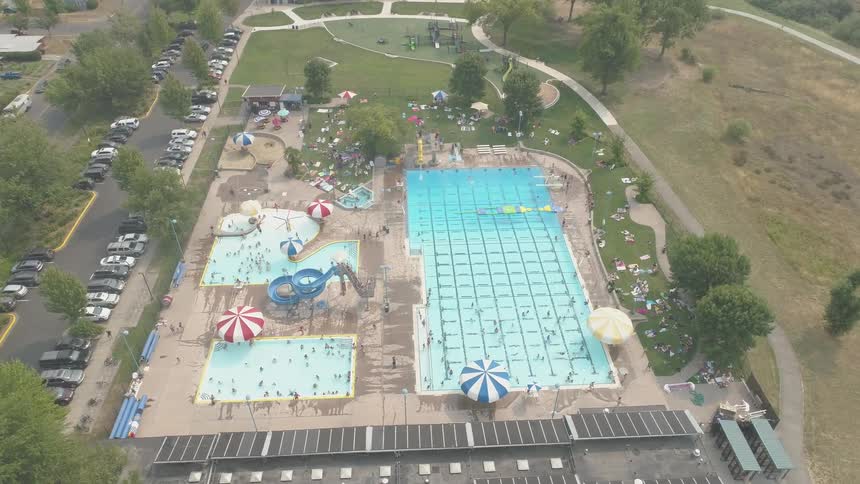 Large water park with people swimming
