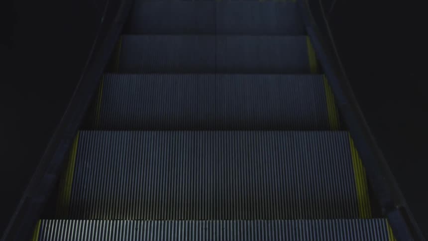 The escalator is going down like escalators do they come to the bottom but keep going