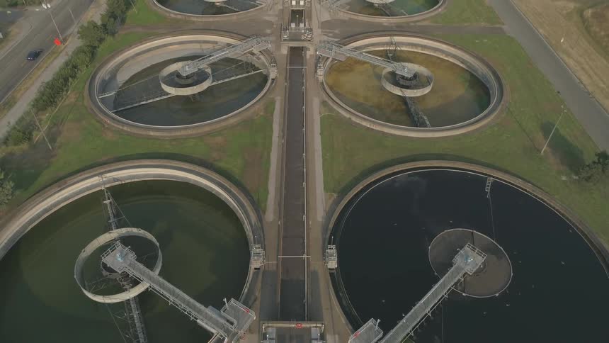 Camera looks down over a water treatment plant