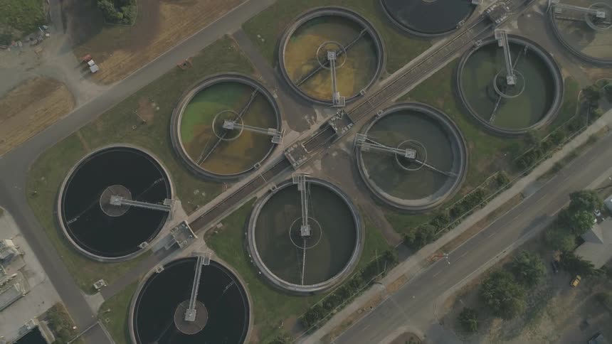 Large commercial tanks of fluids in a variety of colors
