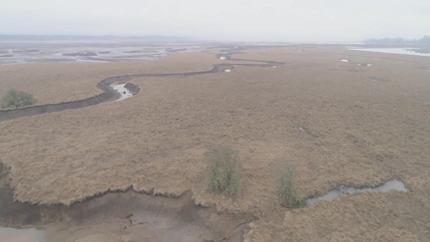 A river flows across the land