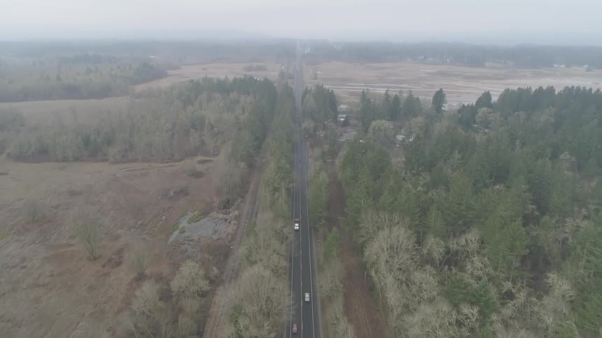 An aerial view of a road on an overcast day