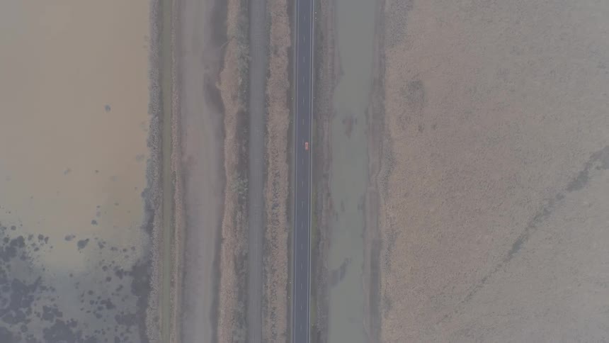 Rural road with cars driving