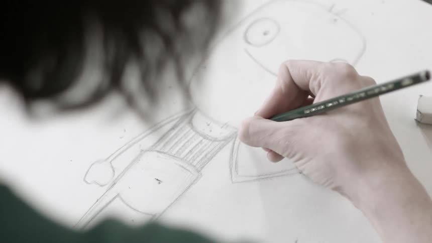 Woman is sketching a character