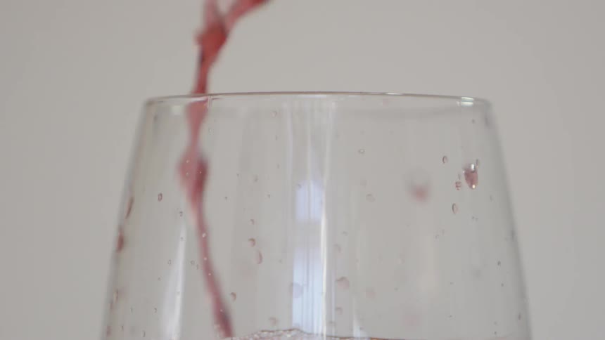 Wine is poured into glass