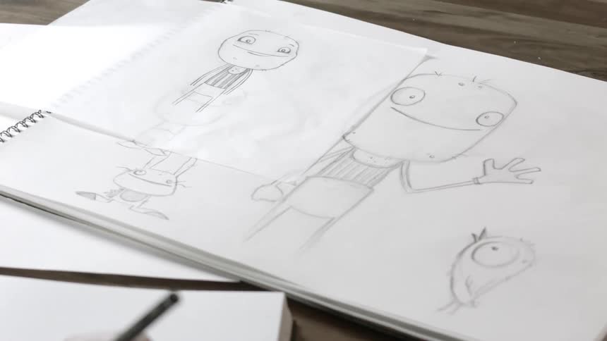 Sketches of characters in a sketchbook