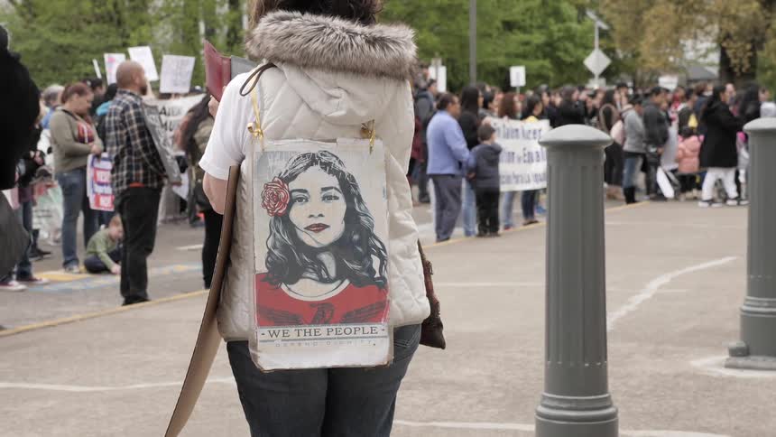 People are protesting outdoors