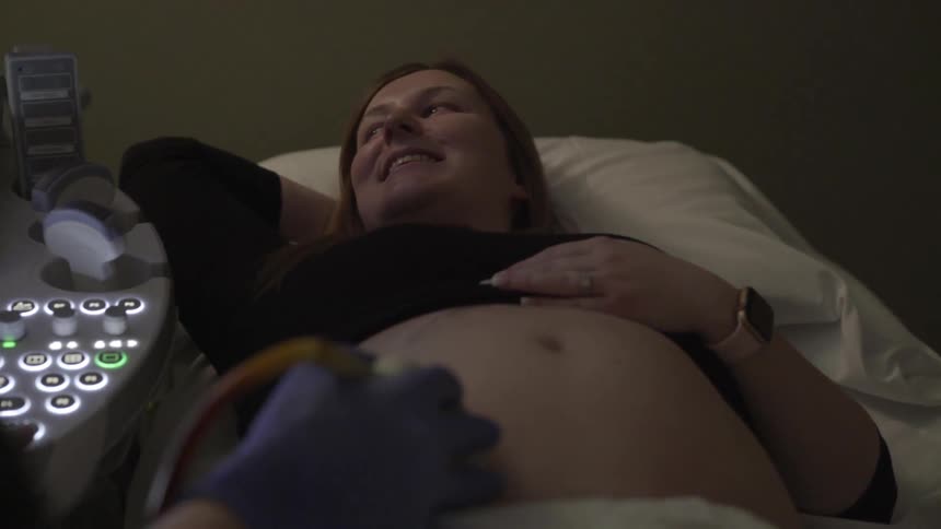 A pregnant woman getting an ultrasound
