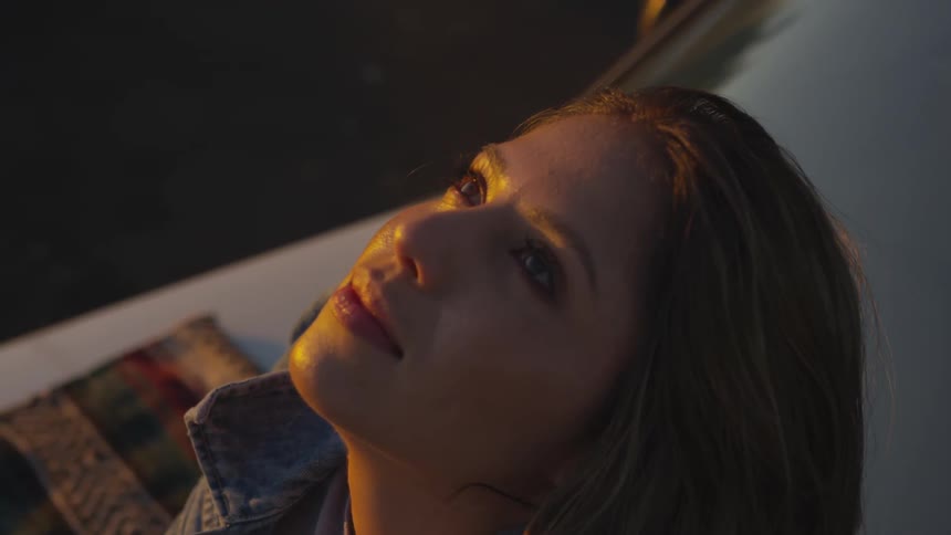 Girl looking up into the sky
