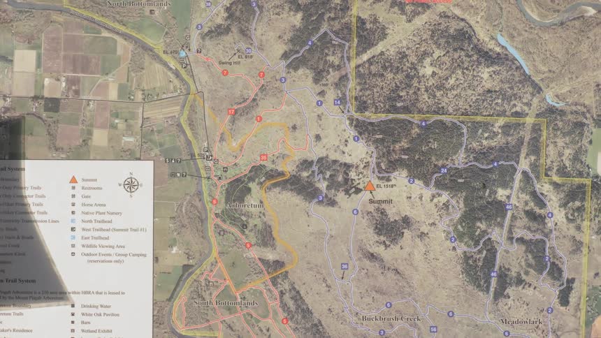 A birds eye view of a map covered with map markers