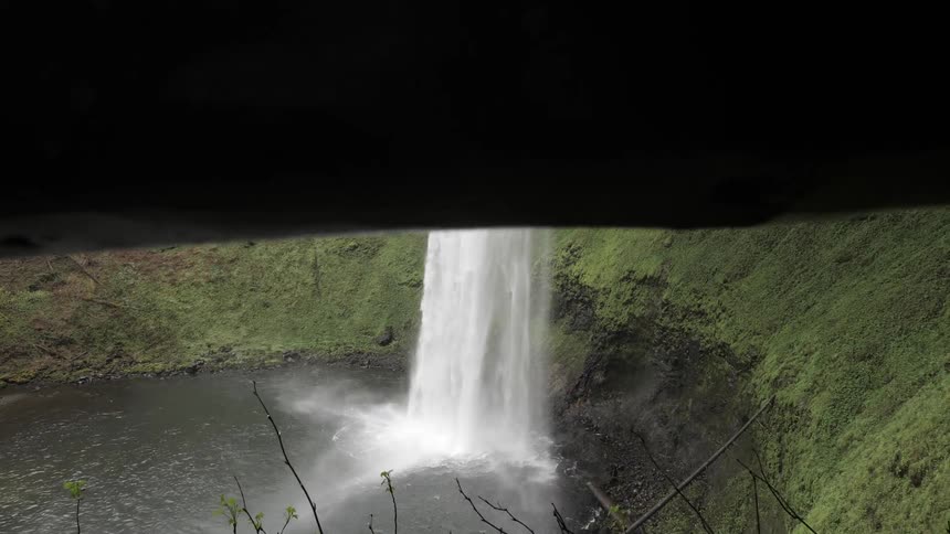 Upwards shot of a waterfall into a lake