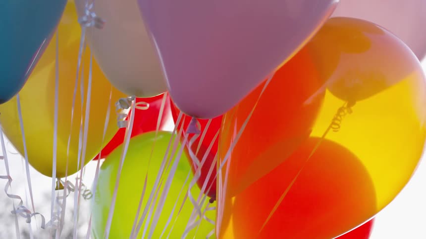 Balloons tied to ribbon