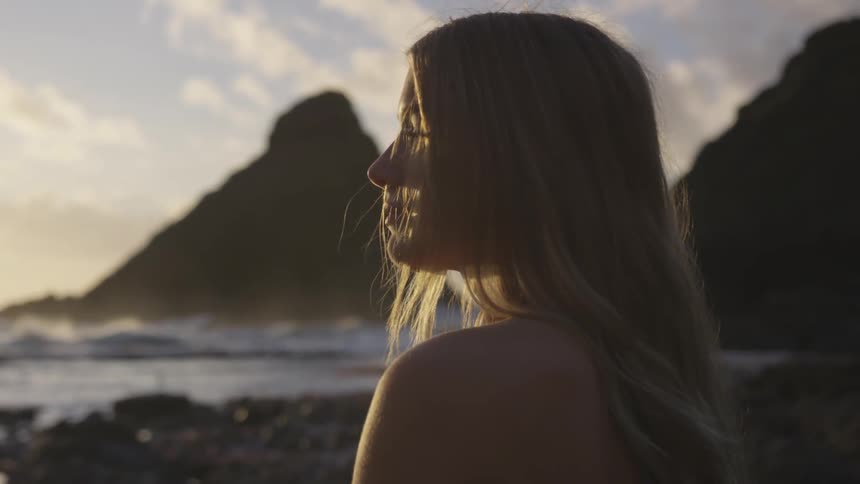 A woman staring off into the distance