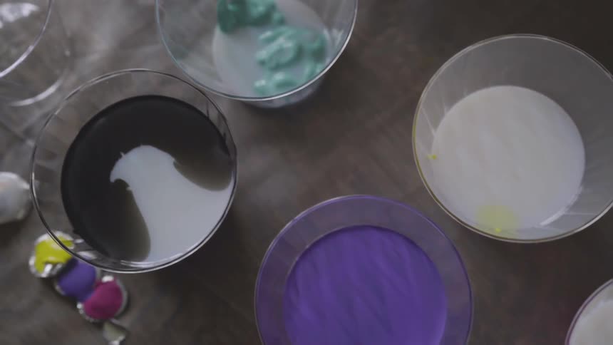 Paint mixtures in different bowls