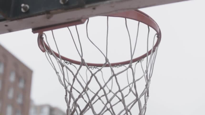 Basketball goes into hoop