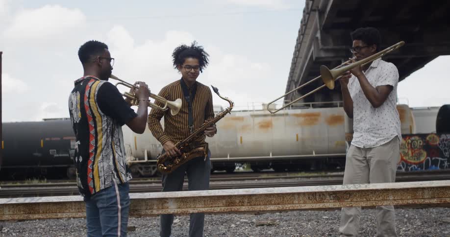 3 friends playing music
