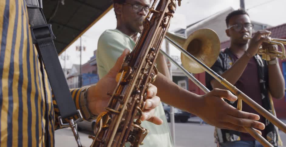 Teenagers playing brass instruments