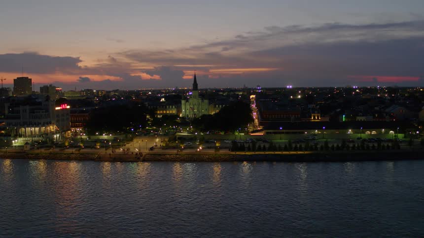 Aerial view of city waterfront at sunset