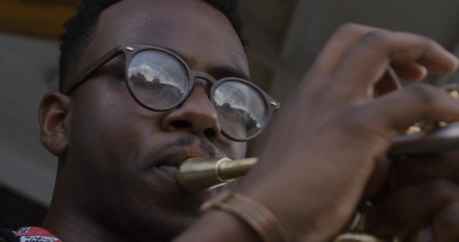 A man plays the trumpet