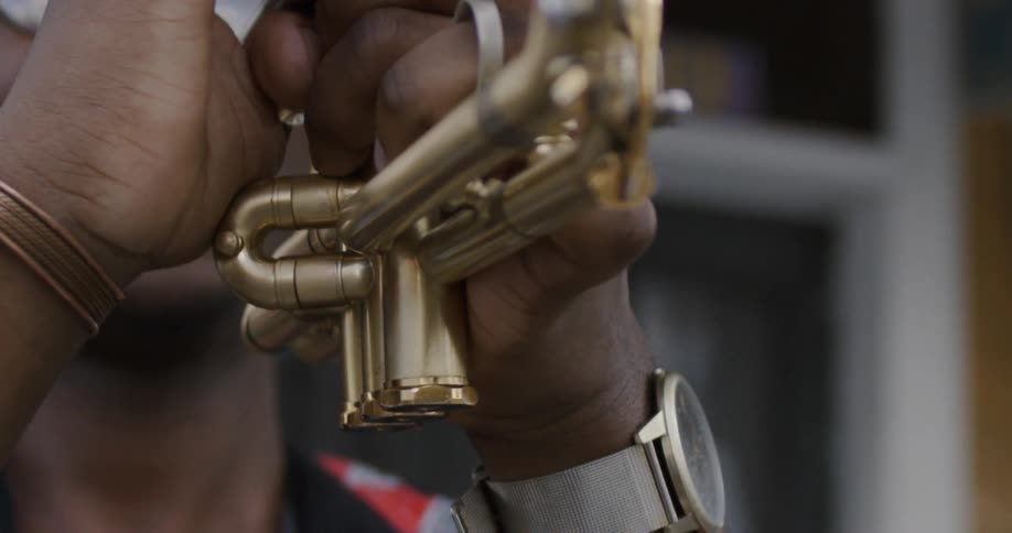A man plays the trumpet