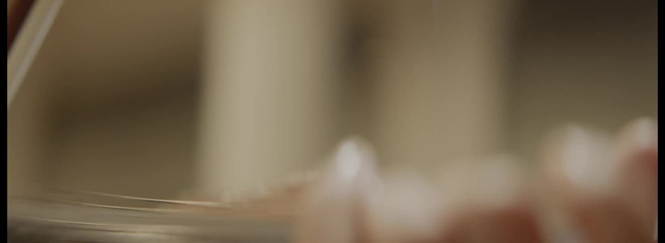 Woman plays on the violin indoors in the daytime