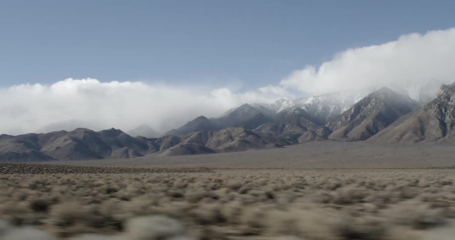 Range of mountains covered with clouds in the daytime
