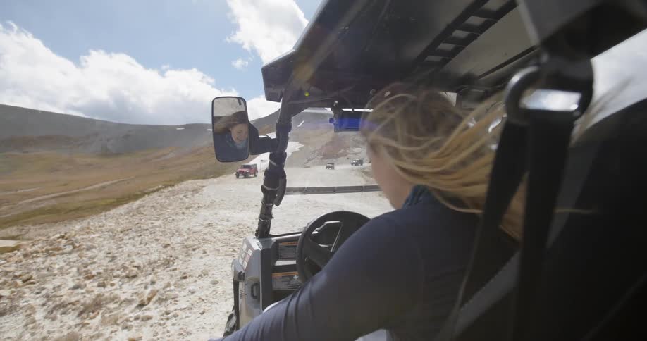 Woman gets in the small buggy