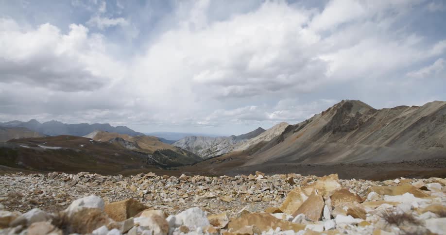 Clouds move over a wide valley