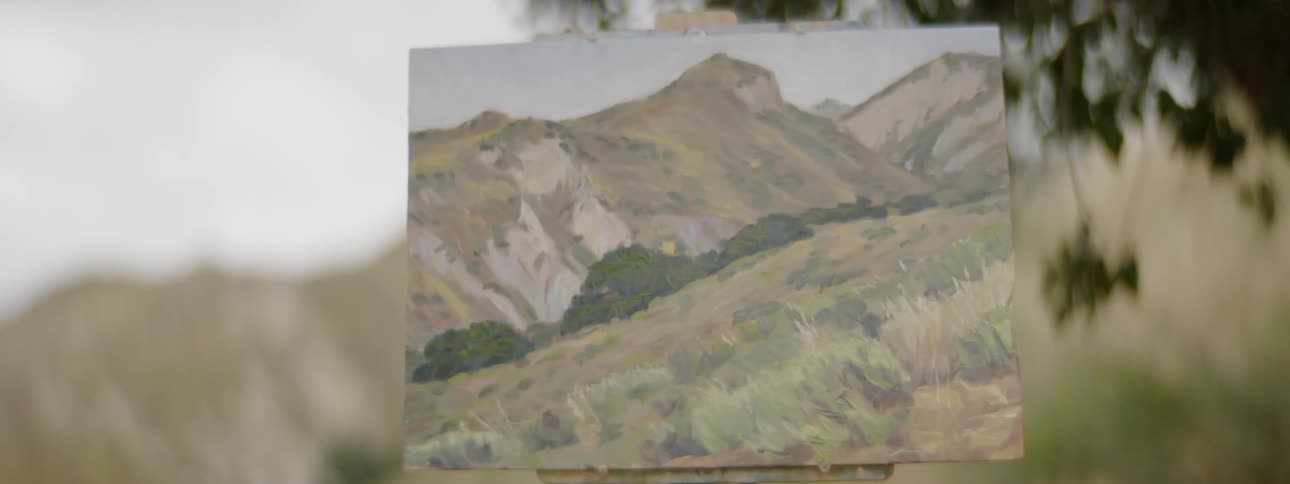 Camera zooms in a painting of mountains