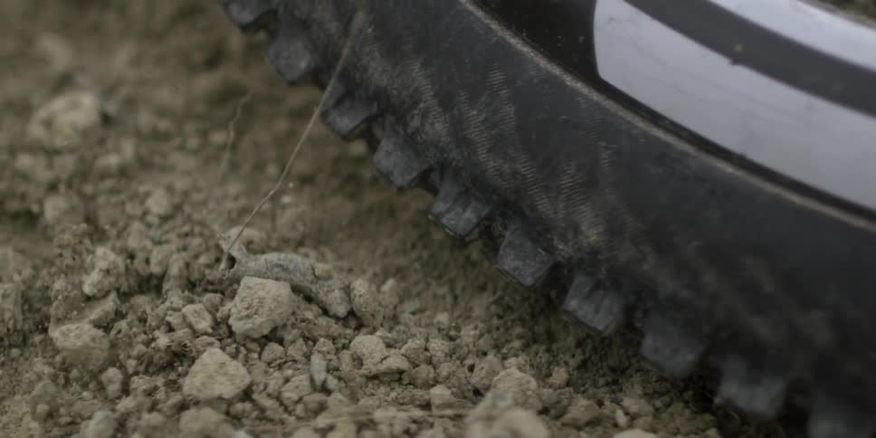 Tire coming to a fast halt in dirt