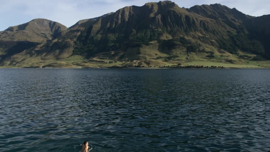 Man Swimming In Lake Hawea
