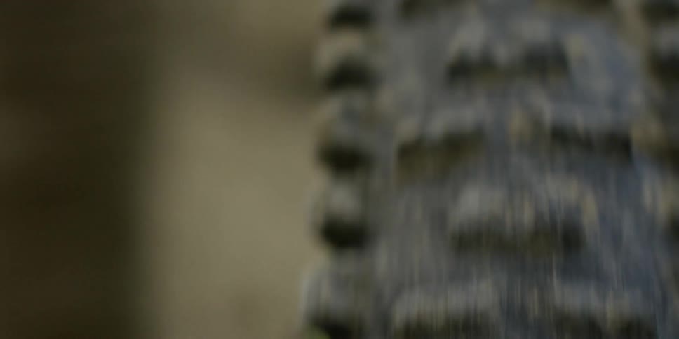 A dirty bike tire rotates