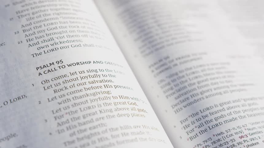 A book that is open to a page full of words