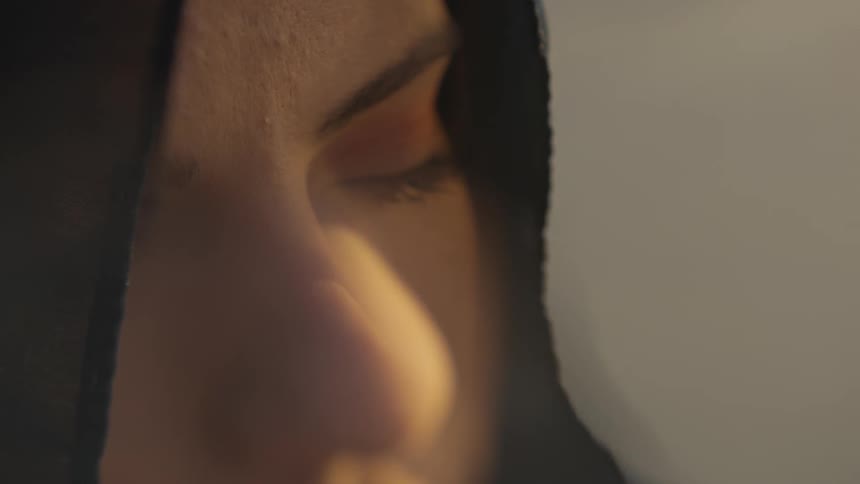 Close up of a young girl with her eyes closed