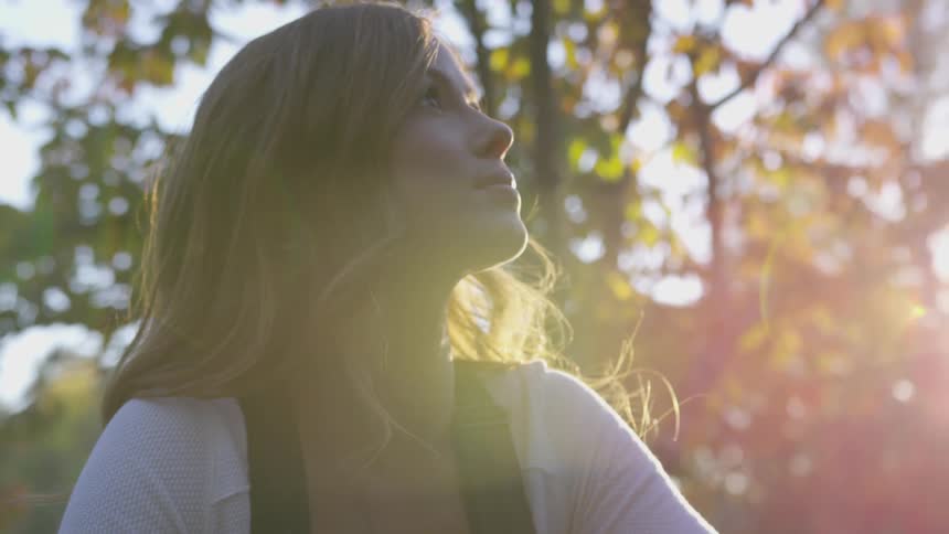 Girl looking around in a park