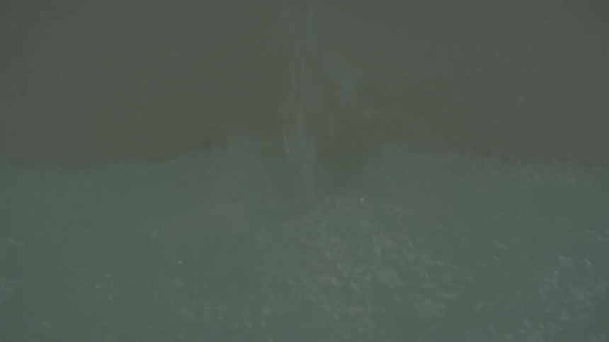 Water filling up a container