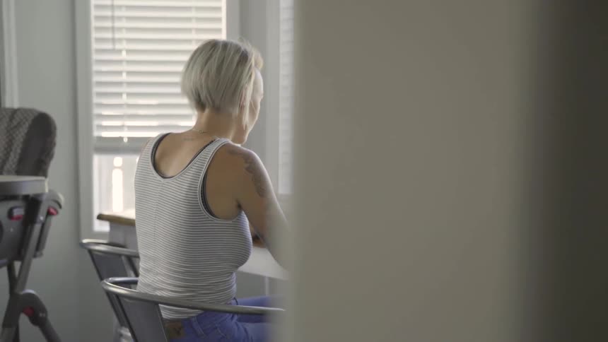 A woman working on a laptop